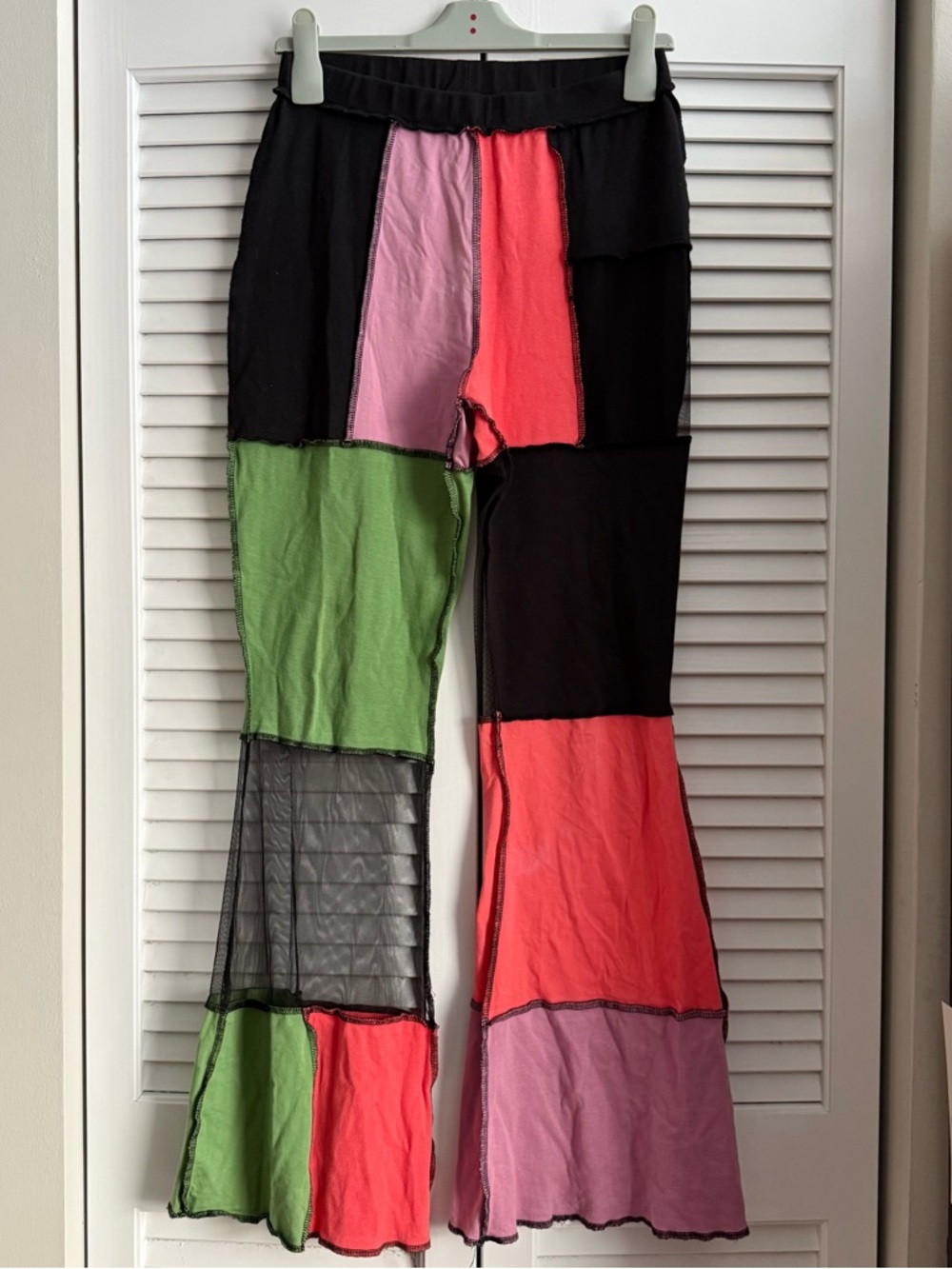 The Ragged Priest Patchwork Flare Pants with Black, Green, Pink & Coral